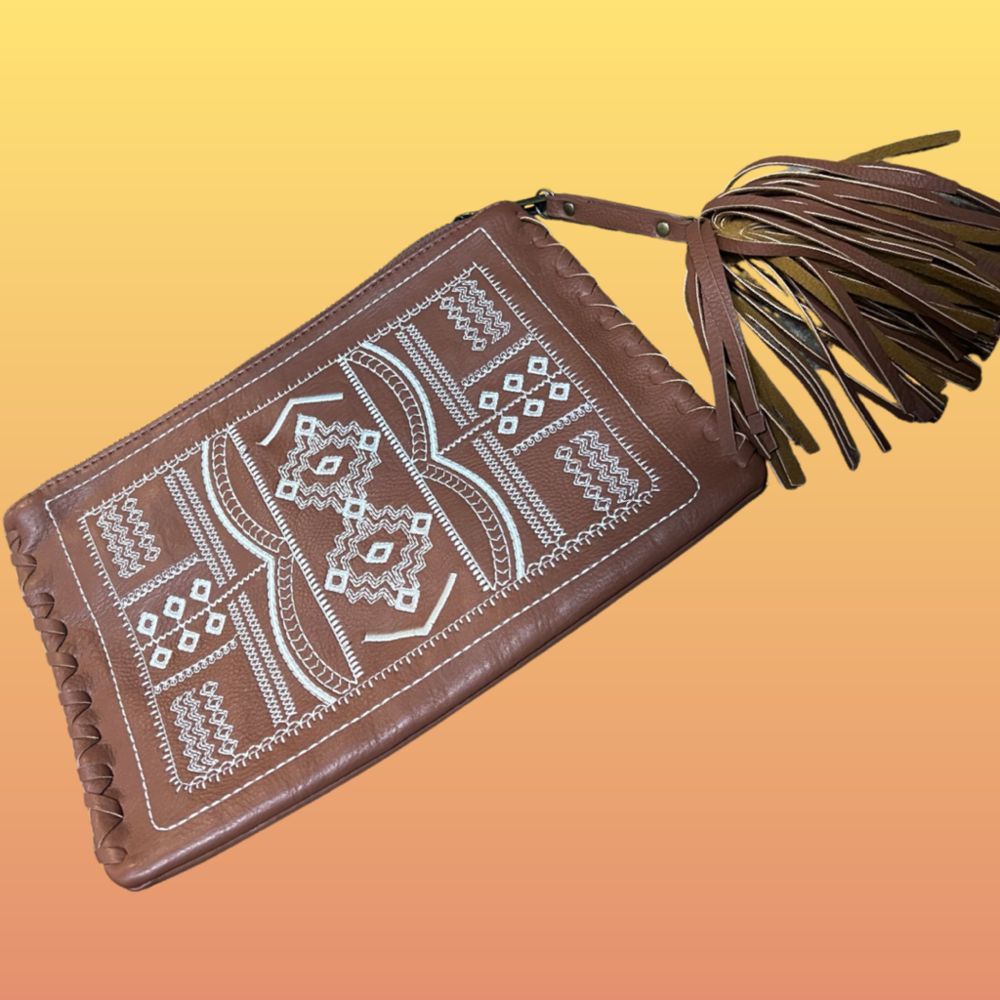 FAUX LEATHER TASSEL CLUTCH